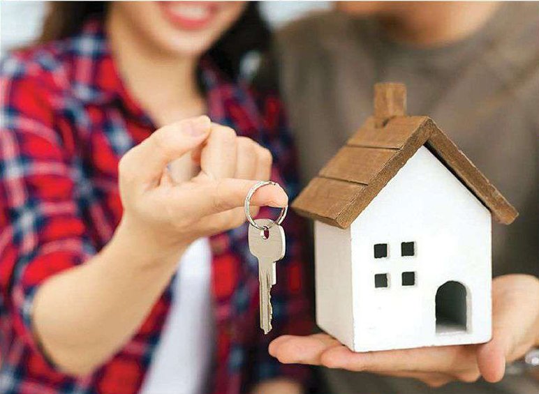 Keys to a new home being handed over